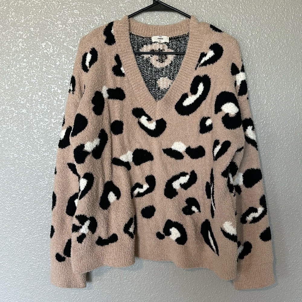 Super soft and cozy cheetah print sweater. Size large.